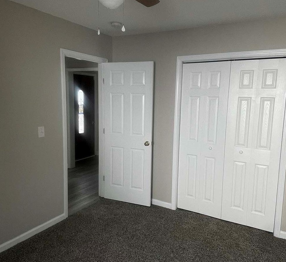 Closet bi-fold door and bedroom passage way door hung and painted